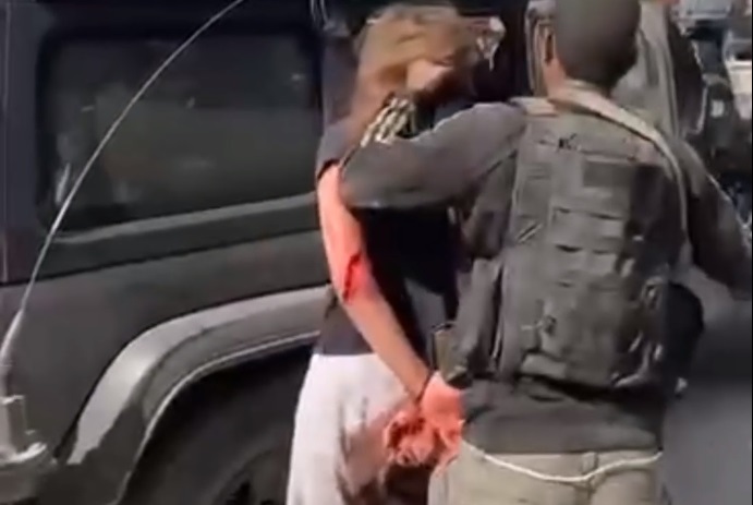 EXTREMELY GRAPHIC Video – Hamas Terrorists Brutally Handling Beaten Israeli Woman Who is Bleeding From Private Area