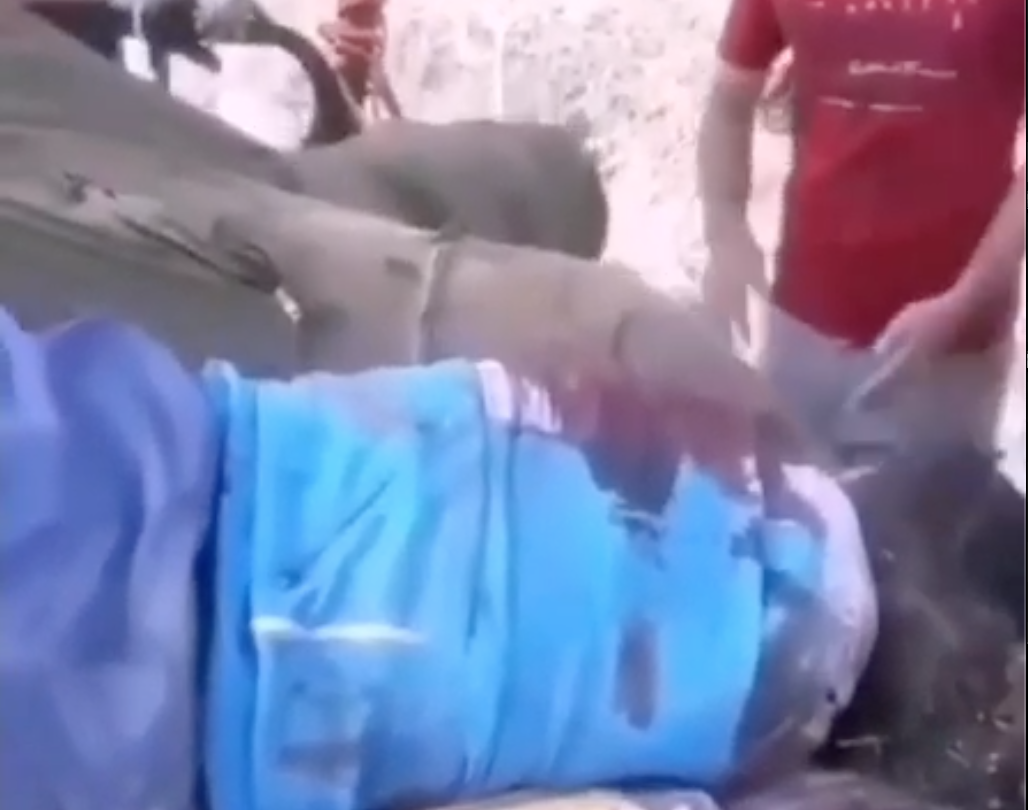 GRAPHIC Video: Two Dead Bodies, Captured By Hamas After The Brutal Massacre On October 7th, And The Crowd Seems To Want To Harm Or Assault The Dead Bodies