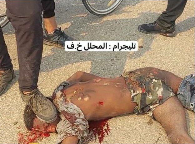 Palestinians mutilated Joshua Mollel dead body and are stepping on his head